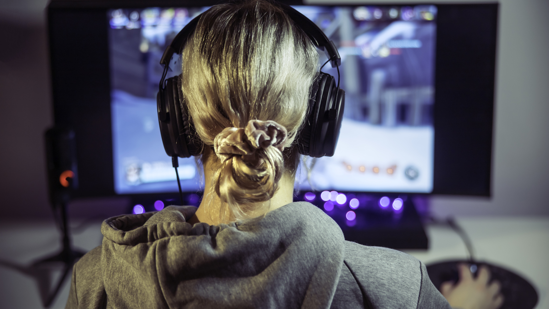 Girl Playing With Computer Blurred